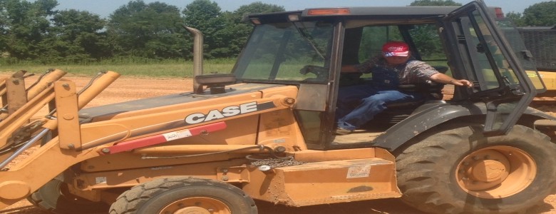 gentleman inside a dozer machine